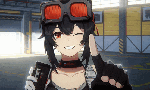 a girl wearing goggles is smiling and holding a cellphone