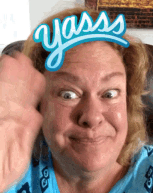 a woman with a yass sign on her head
