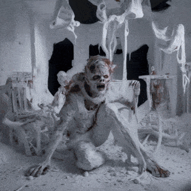 a statue of a zombie is covered in white clay