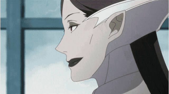 a close up of a woman 's face with a white headband on