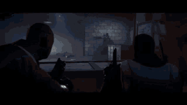 a shadow of a person is cast on a wall