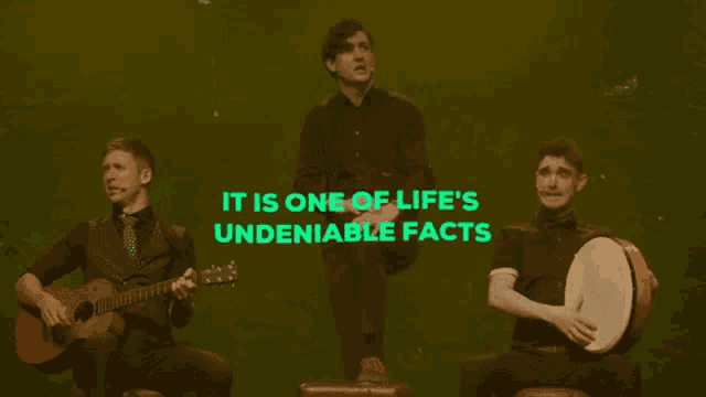 three men playing instruments with the words it is one of life 's undeniable facts behind them