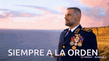 a man in a military uniform is standing in front of the ocean with the words siempre a la orden below him