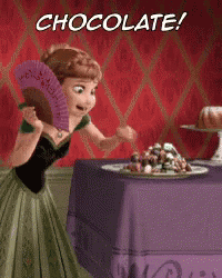 anna from frozen is holding a fan and looking at a plate of chocolates
