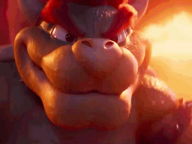 a close up of a cartoon character 's face with a fire background .