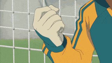a drawing of a person 's fist in front of a goal net