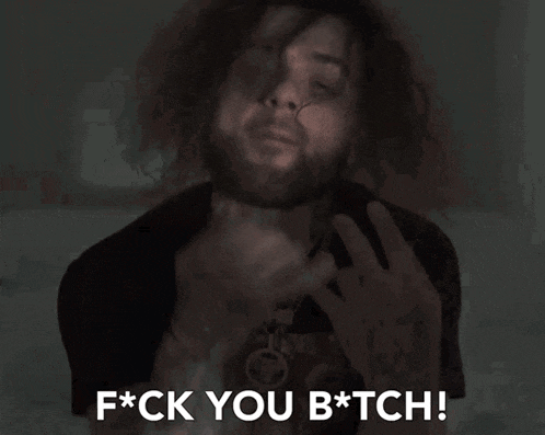 a man with a tattoo on his arm says f * ck you b * tch !