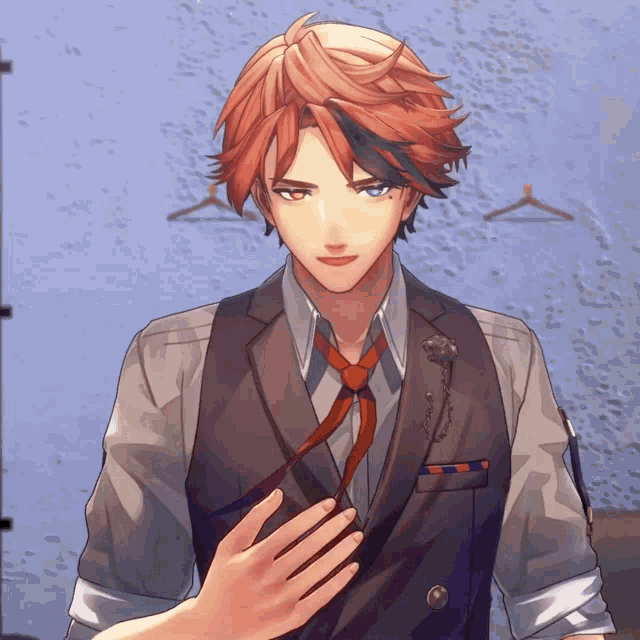 a man in a suit and tie is being touched by a hand
