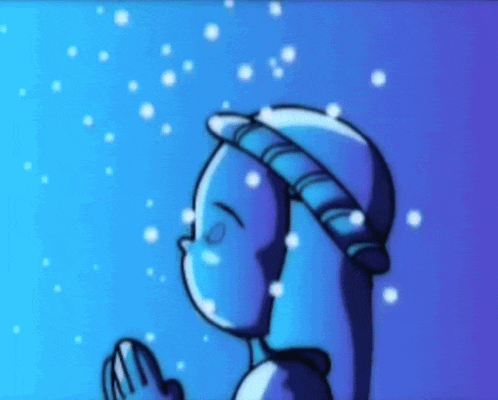 a blue cartoon character is praying in the snow while wearing a hat .