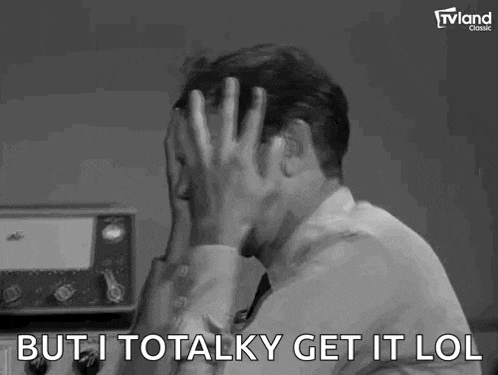 a man is covering his face with his hands and says `` but i totalky get it lol '' .