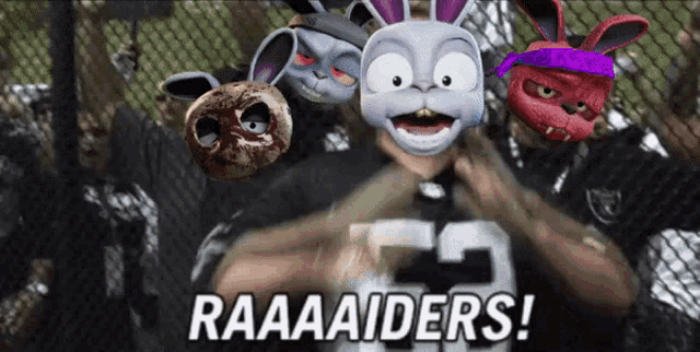 a man wearing a raiders jersey is surrounded by cartoon characters and says raaaaaiders