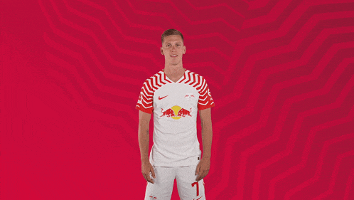 a man in a red and white jersey with the number 7