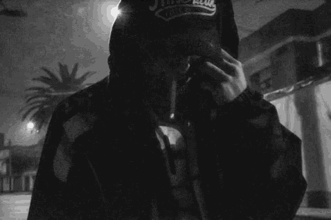 a man wearing a hat that has the word falcon on it