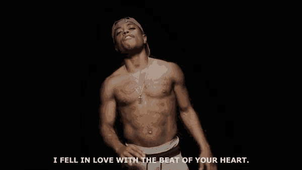 a shirtless man is holding his hands to his chest and says i fell in love with the beat of your heart