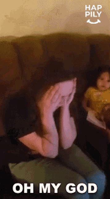 a woman is sitting on a couch covering her face with her hands and the words oh my god are written above her