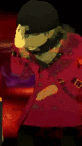 a cartoon character with a red coat and black hat