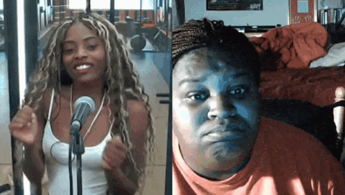 a woman singing into a microphone next to another woman making a face