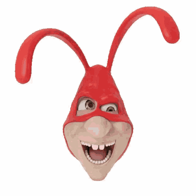 a cartoon character is wearing a red mask and has a big smile on his face .