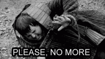 a black and white photo of a person laying on the ground with the words `` please , no more '' written on it .