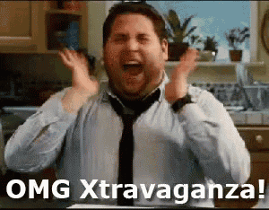 a man in a tie is screaming in a kitchen with the words omg xtravaganza written above him .