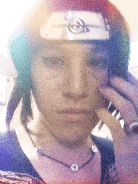 a blurry photo of a person wearing a headband