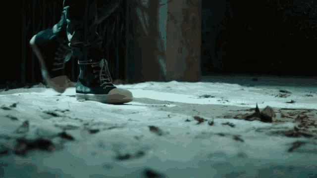 a person 's feet are shown in a close up of their shoes
