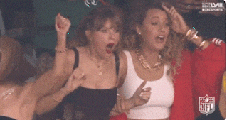 a group of women are sitting in a stadium with the nfl logo on the bottom right