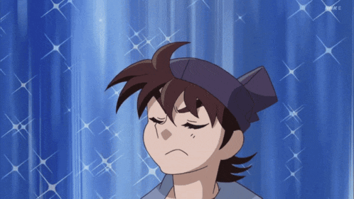 a cartoon character with a purple headband and a blue background with the letter k on it