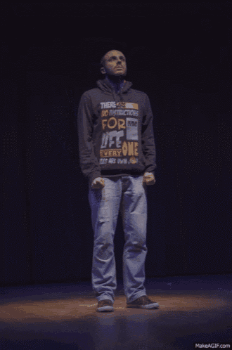 a man is wearing a hoodie that says there are no instructions for life