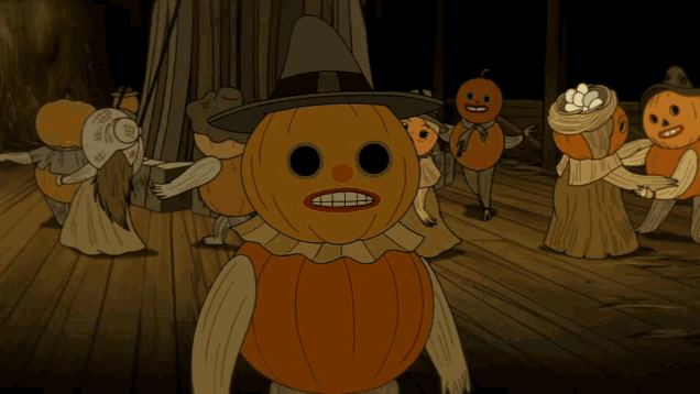 a group of scarecrows with pumpkins on their faces are dancing in a dark room
