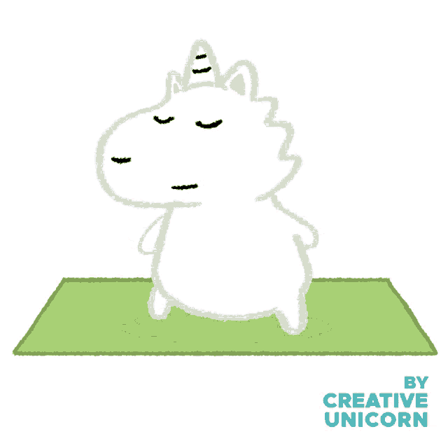 a drawing of a unicorn on a yoga mat with the words by creative unicorn below it