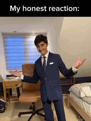 a man in a suit and tie is standing in front of an office chair with his arms outstretched and the words my honest reaction below him