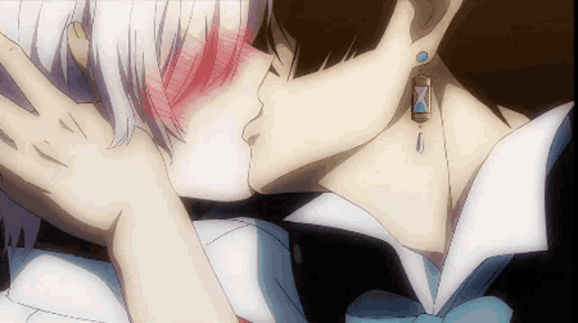 a man and a woman kissing with a hourglass earring in the background