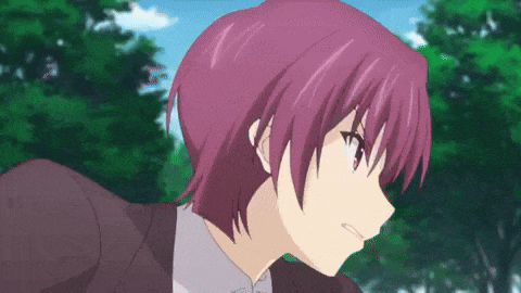 a close up of a person with purple hair and a black jacket
