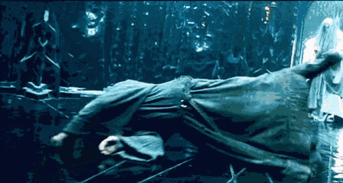 a man is laying on his back in the water