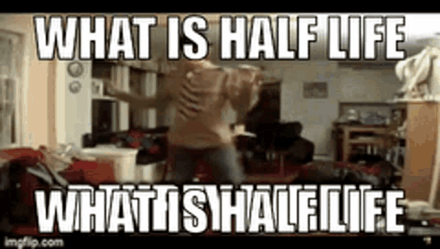 a man is dancing in a living room with a caption that says `` what is half life what is halflife '' .