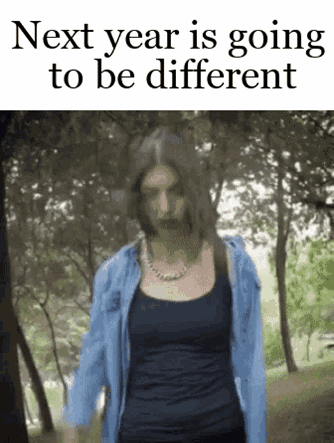 next year is going to be different with a picture of a woman walking in the woods