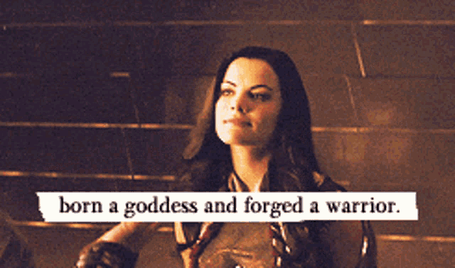 a woman is holding a piece of paper with the words born a goddess and forged a warrior below her
