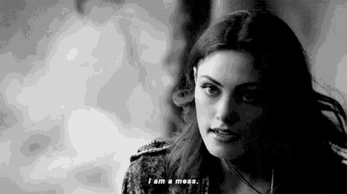 a black and white photo of a woman with long hair saying `` i am a moss . ''