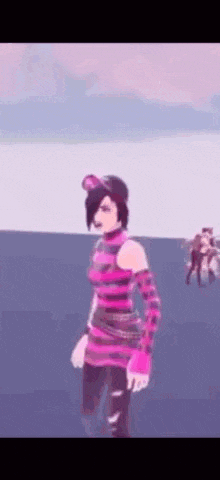 a woman in a pink and black striped dress is standing in front of a group of people .