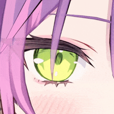 a close up of a person 's eye with a green pupil
