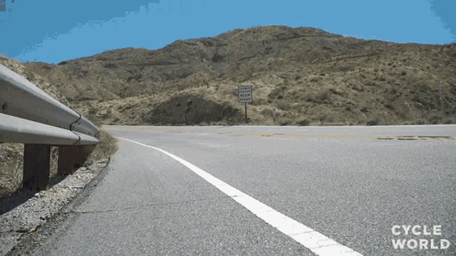 a sign on the side of a road says keep right