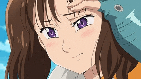a close up of a girl with purple eyes holding a bird on her head .