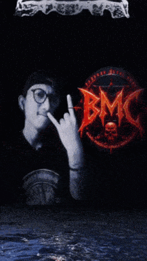 a man smoking a cigarette in front of a waterfall with a logo that says bmc