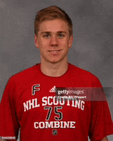 a young man in a red nhl scouting 75 combine shirt