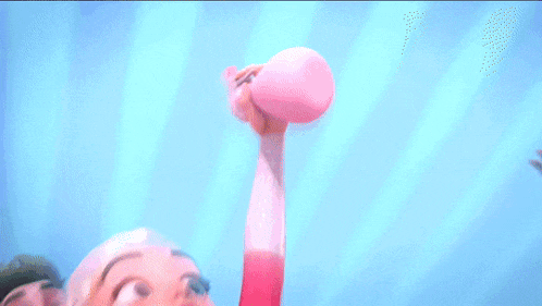 a group of cartoon characters are standing next to each other in the air .