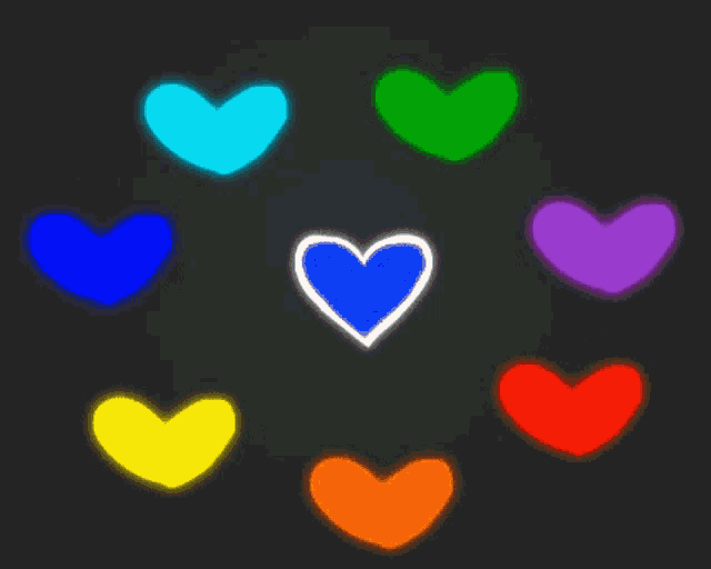 a circle of hearts of different colors on a black background