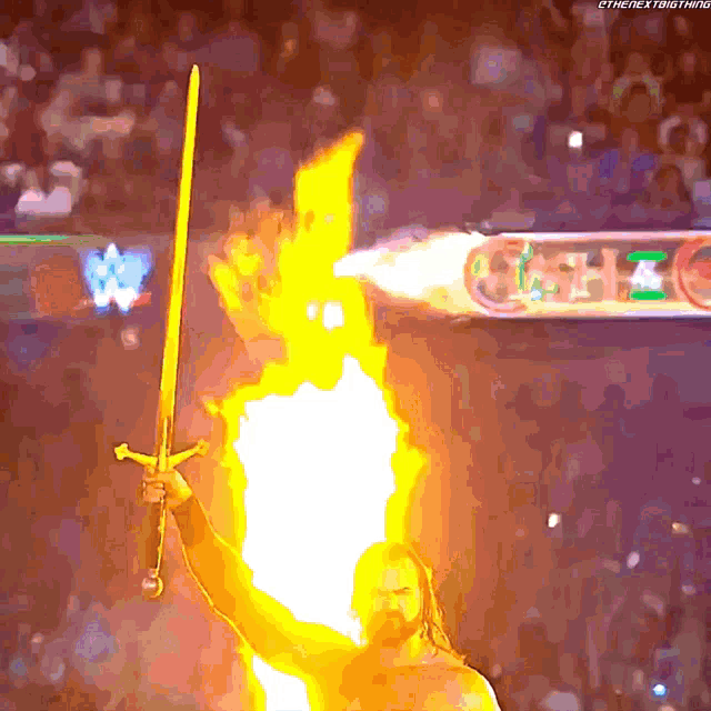 a man is holding a sword in front of a sign that says the next thing