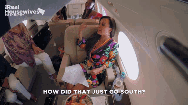 a real housewives ad shows a woman sitting on a plane