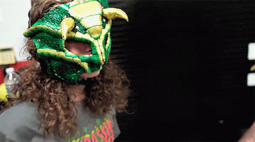 Babysaurus Put On Mask GIF - Babysaurus Put On Mask Green Mask GIFs